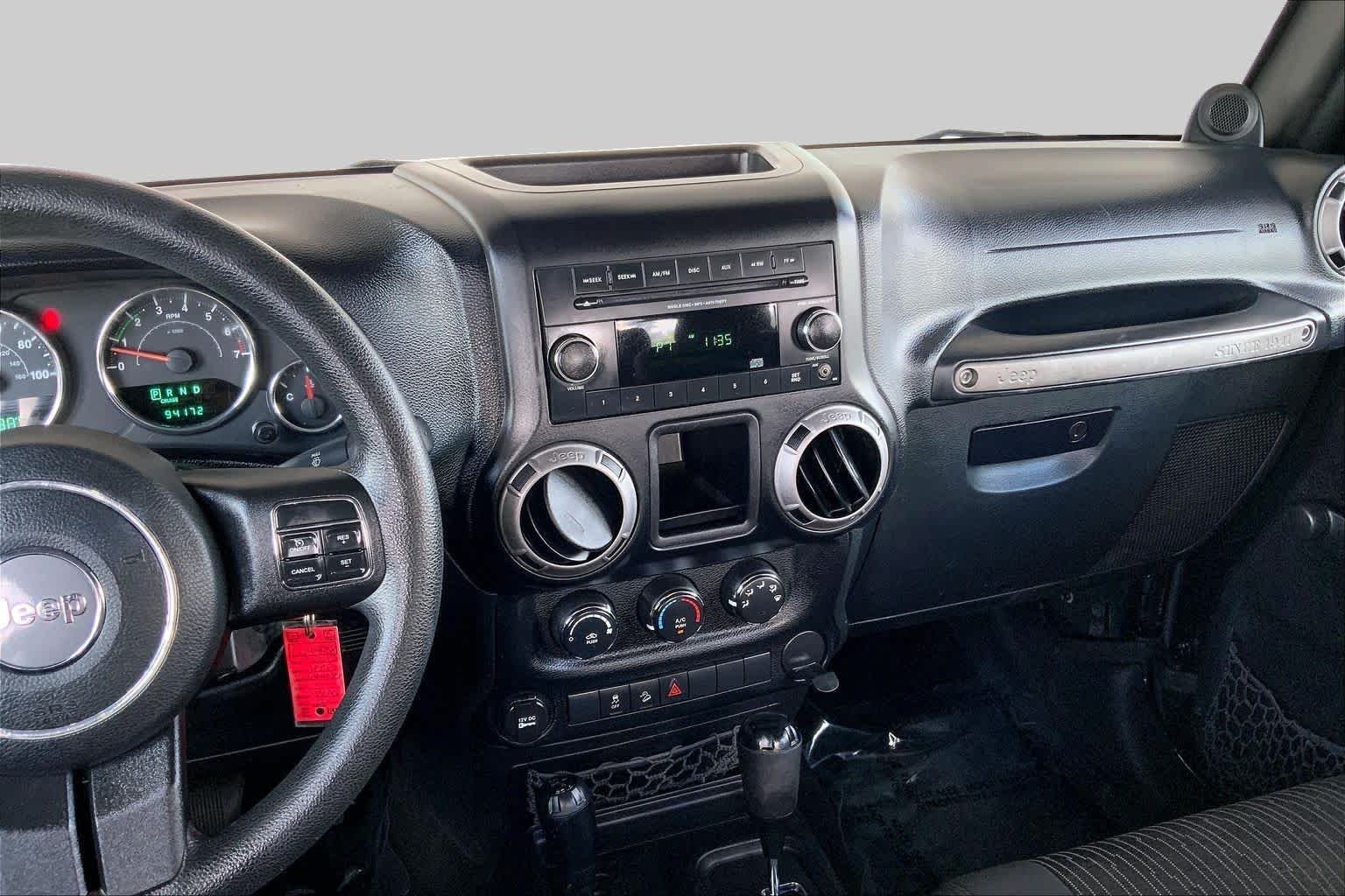 Used 2012 Black Forest Green Pearl Jeep Sport image 6
