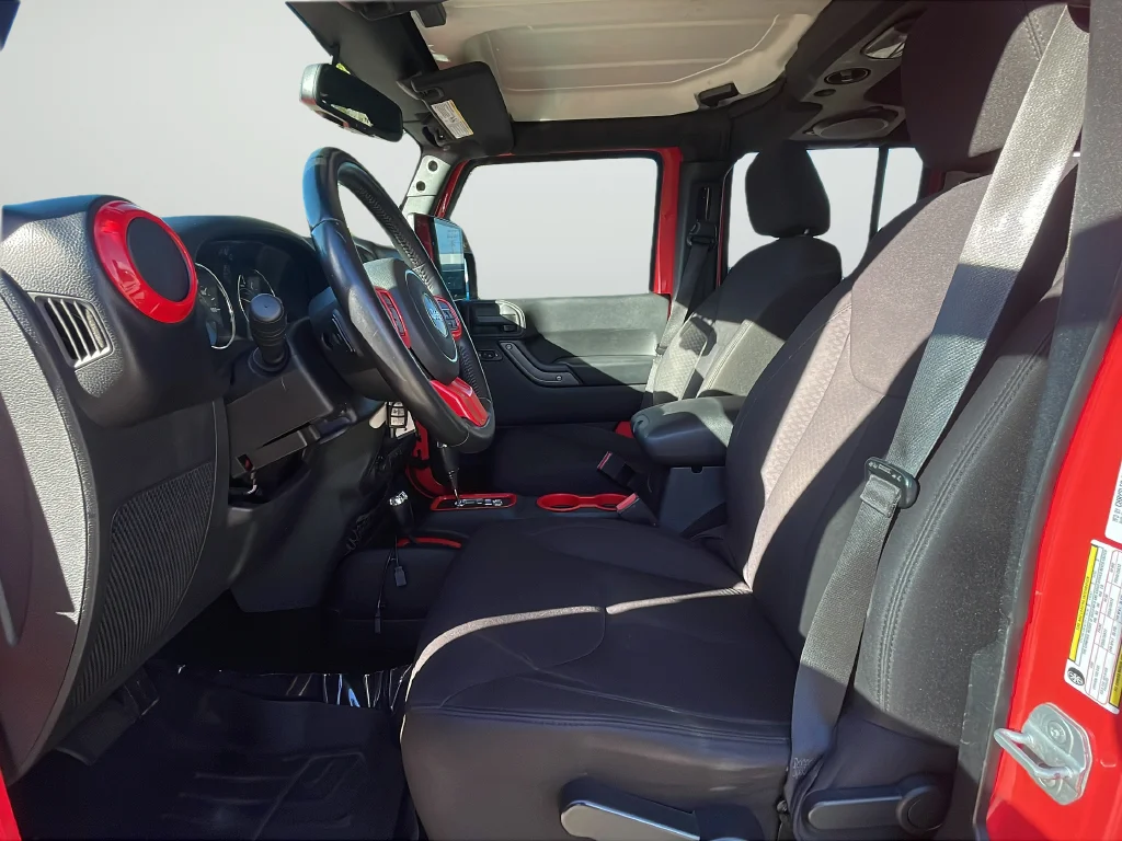 Used 2013 Red Jeep Unlimited Sport image 11