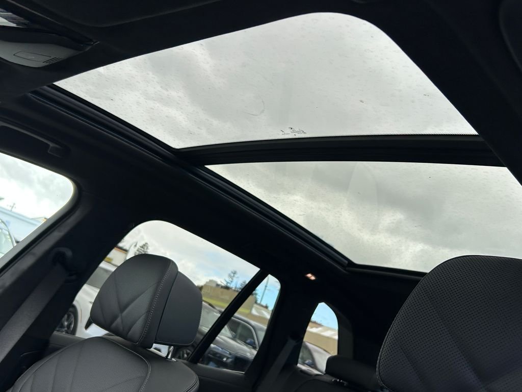 New 2026 Black Sapphire Metallic BMW xDrive50e image 16