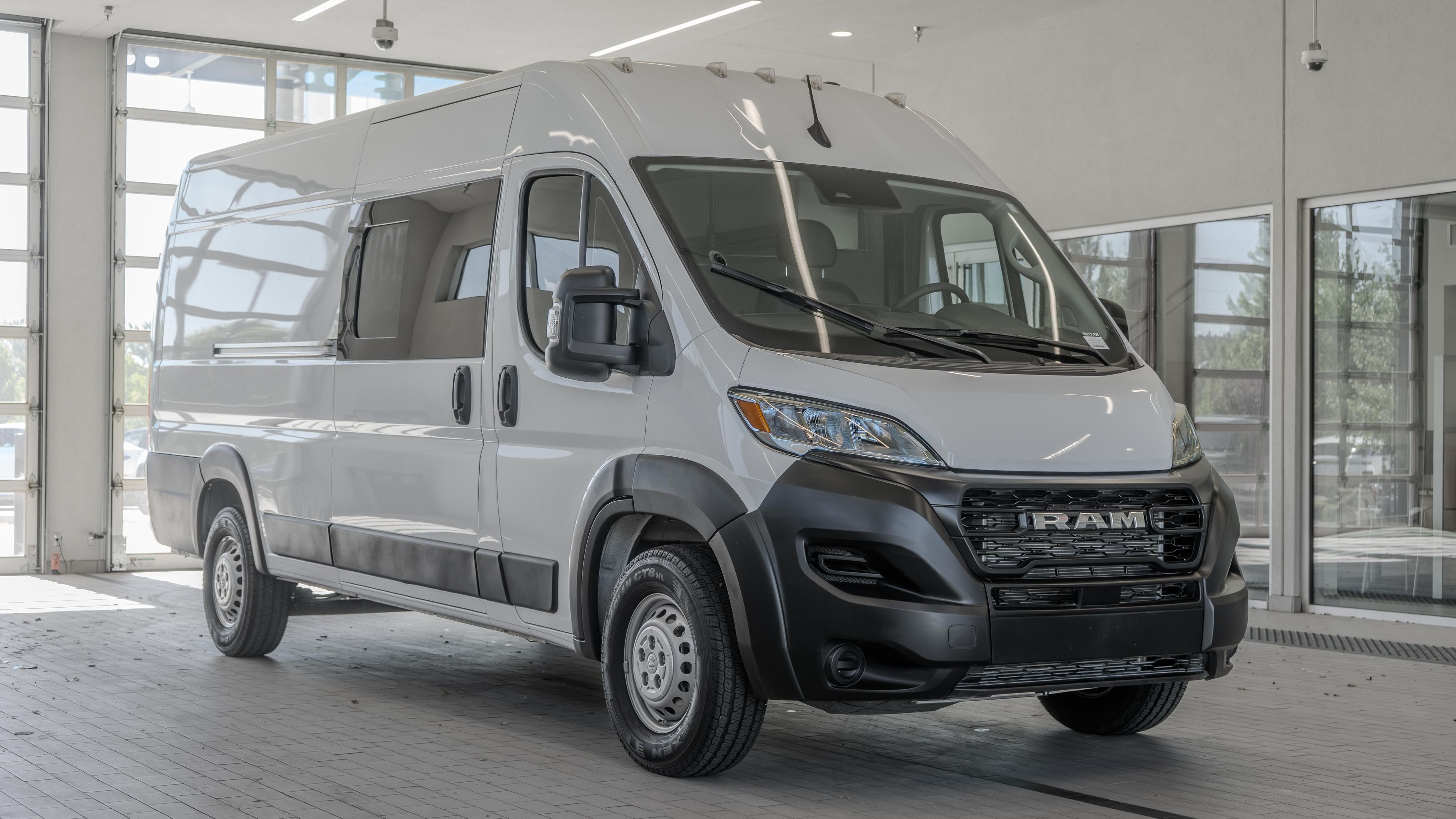 Used 2024 Bright White Clearcoat Ram High Roof image 21