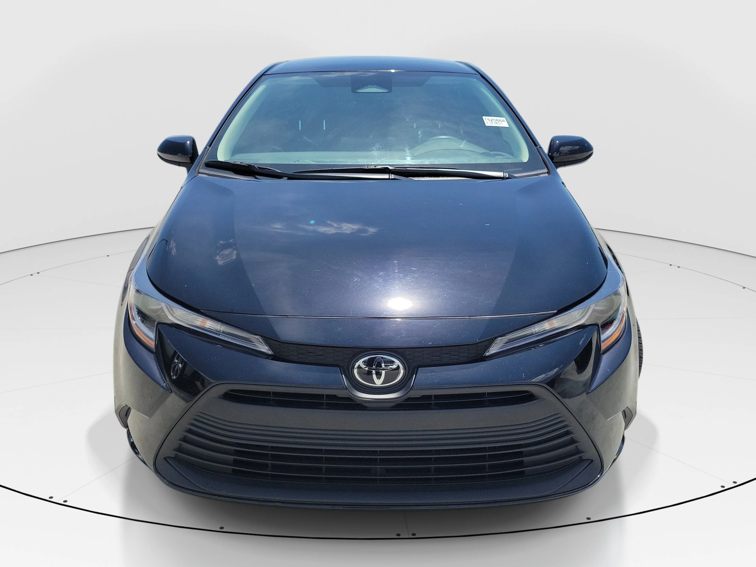 Used 2025 Midnight Black Metallic Toyota LE image 2