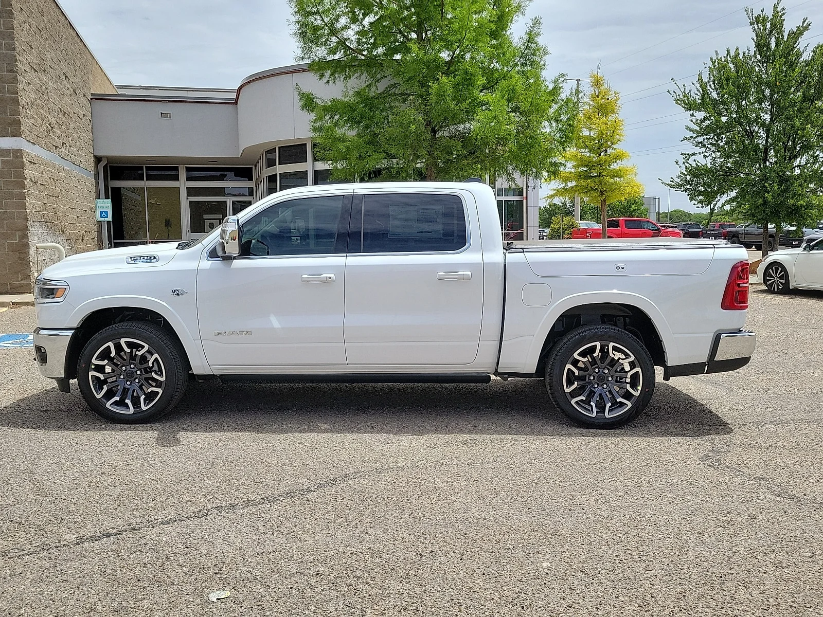 New 2026 Bright White Ram LIMITED LONGHORN CREW CAB 4X4 5