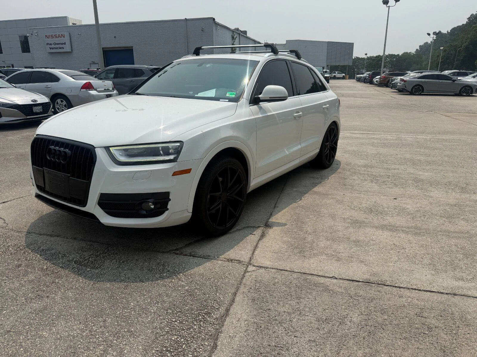 Used 2015 Glacier White Metallic Audi 2.0T Premium Plus image 1
