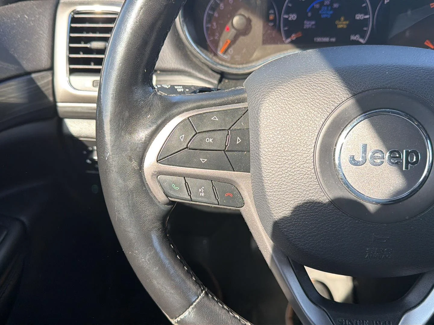 Used 2021 Granite Crystal Metallic Clearcoat Jeep Laredo E image 14