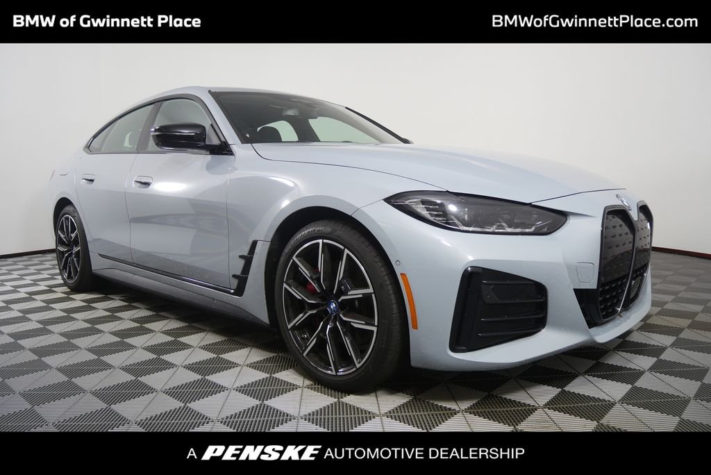 Certified Used 2023 Gray Metallic BMW eDrive40 image 1