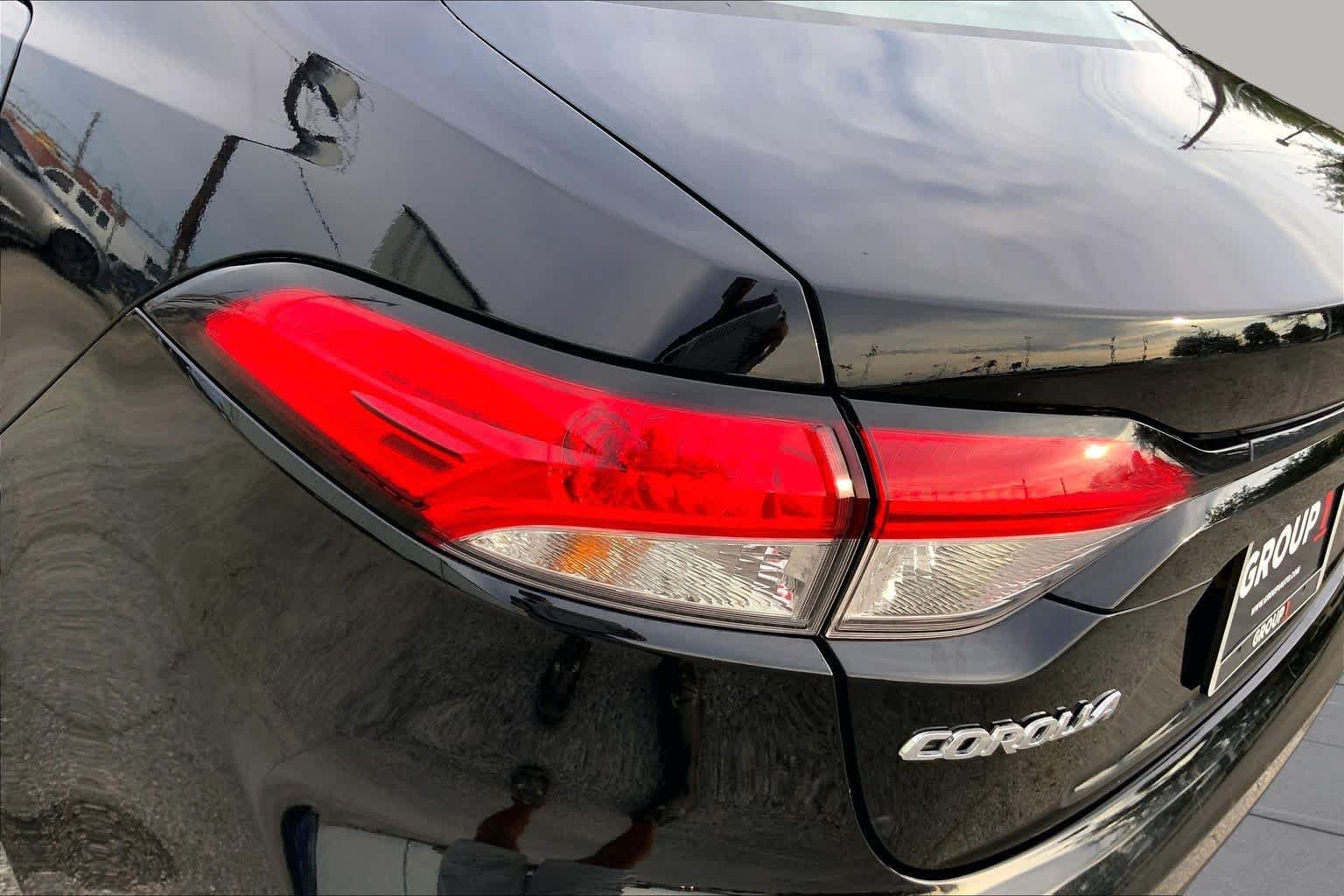 Used 2025 Midnight Black Metallic Toyota LE image 29