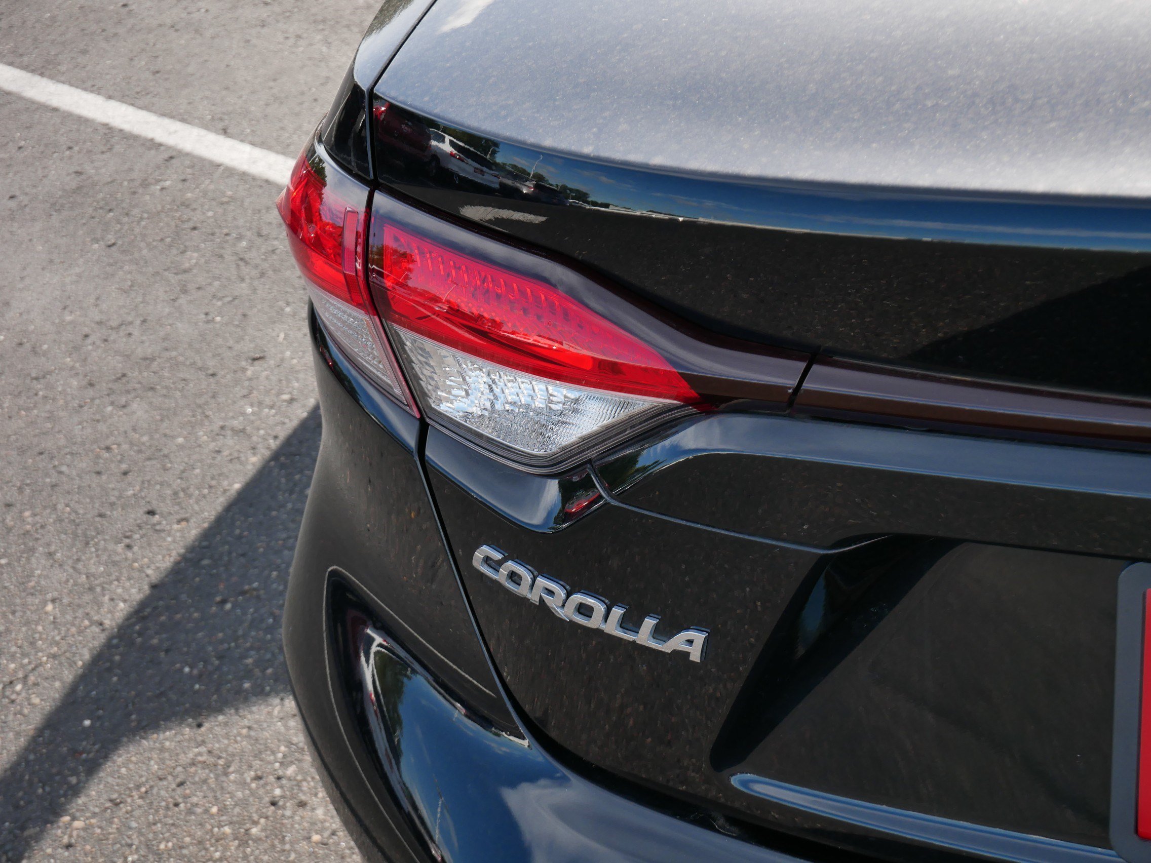 Used 2025 Midnight Black Metallic Toyota Hybrid LE image 17