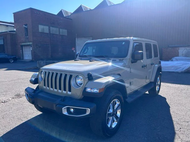 Used 2022 Beige Jeep Unlimited Sahara image 1