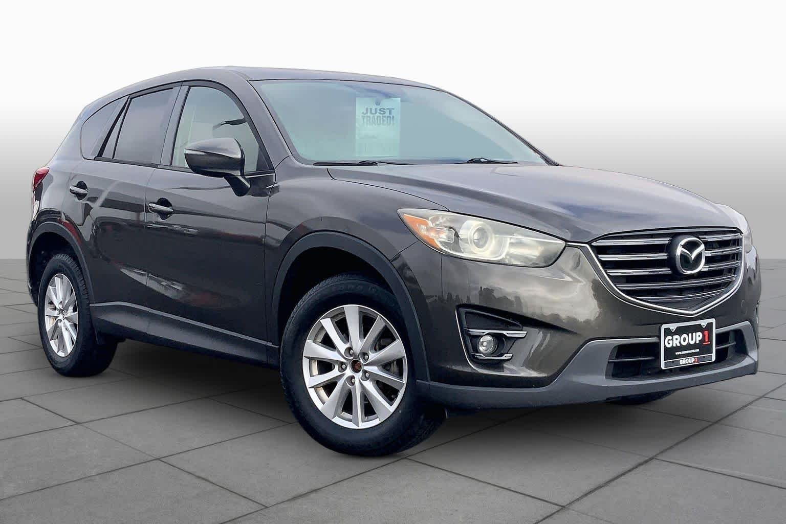 Used 2016 Titanium Flash Mica Mazda Touring image 3