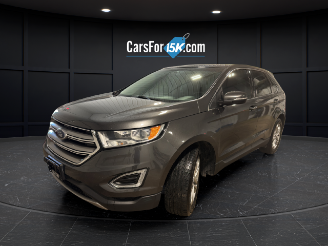 Used 2015 Magnetic Metallic Ford Titanium image 3