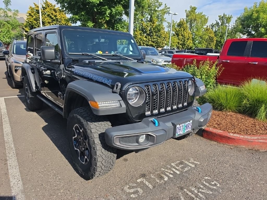 Used 2022 Black Clearcoat Jeep Unlimited Rubicon 4xe image 1