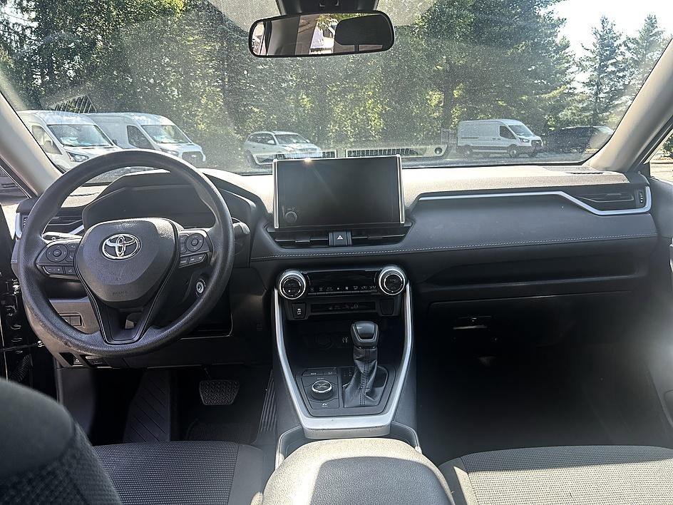Used 2023 Midnight Black Metallic Toyota Hybrid LE image 13