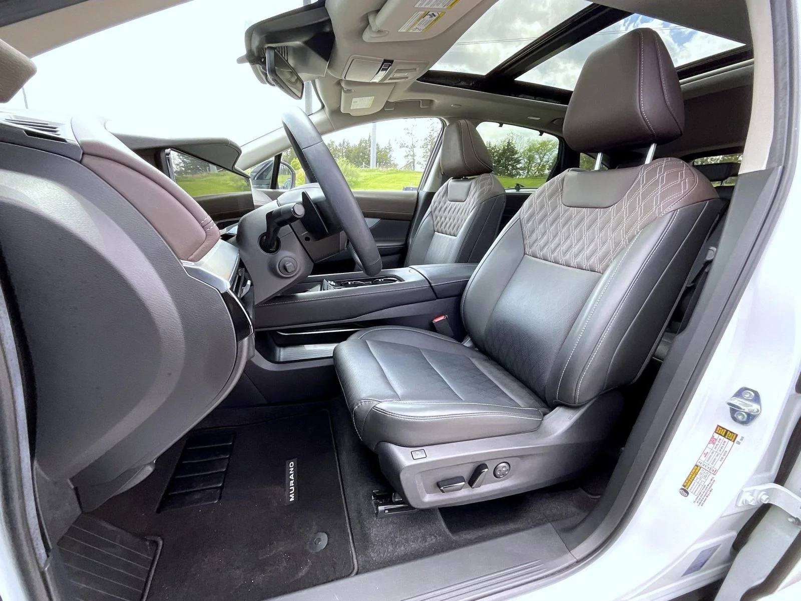 Certified Used 2025 White Nissan Platinum image 11