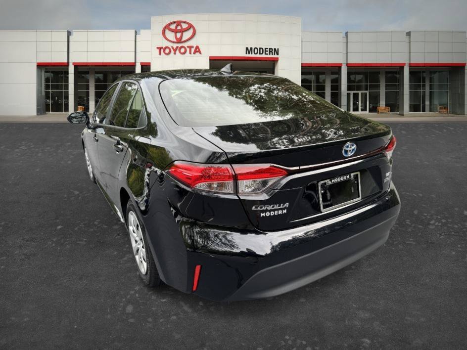 Used 2024 Midnight Black Metallic Toyota Hybrid LE image 9