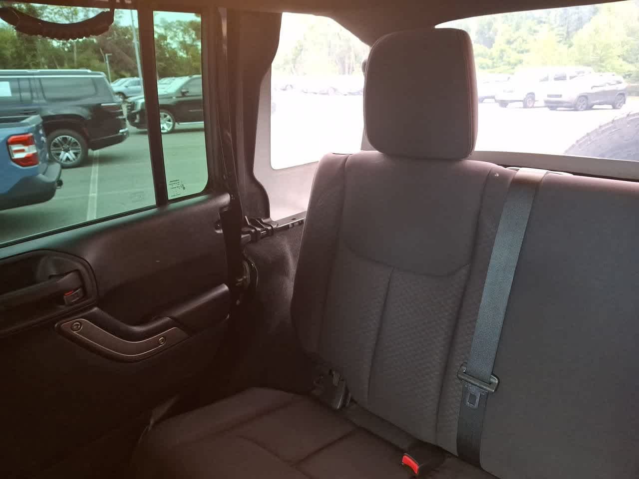 Used 2013 Black Clearcoat Jeep Sport image 12