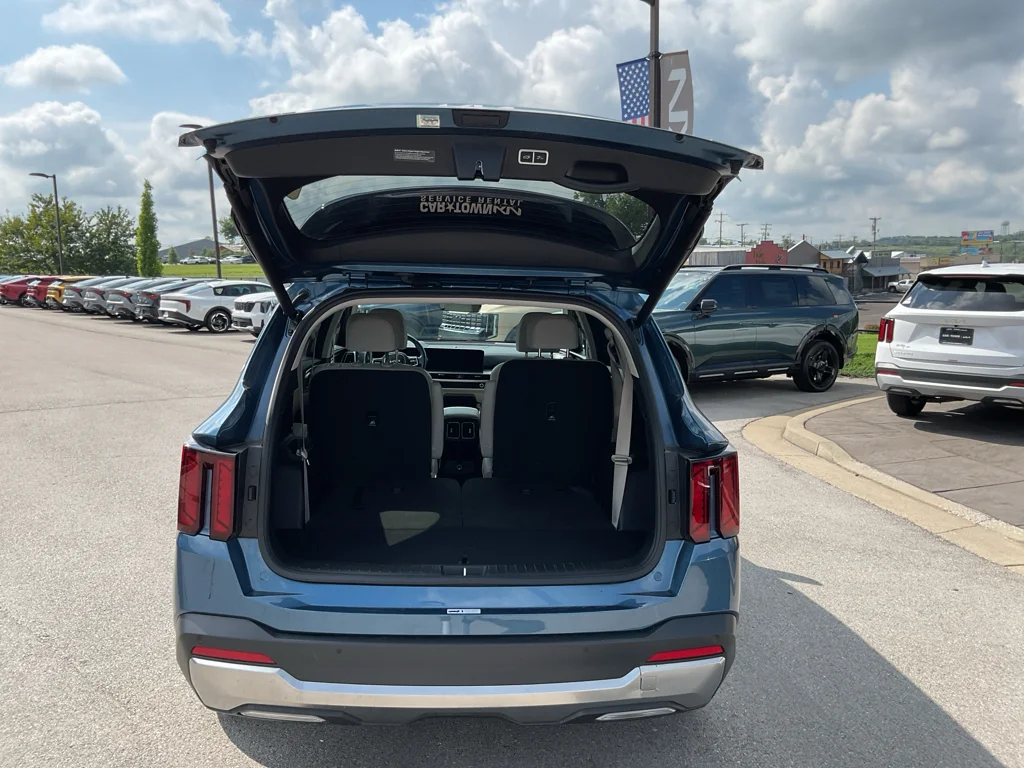 Used 2025 Mineral Blue Kia EX image 9