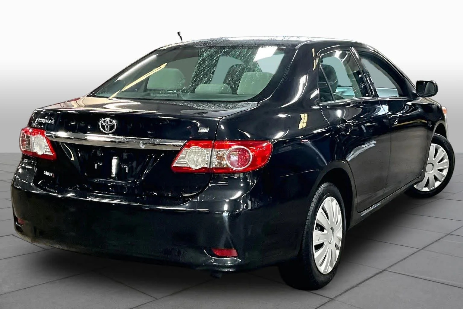 Used 2013 Black Sand Pearl Toyota LE image 13