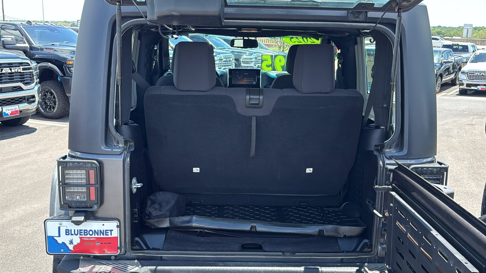 Used 2014 Granite Crystal Metallic Clearcoat Jeep Sport image 19