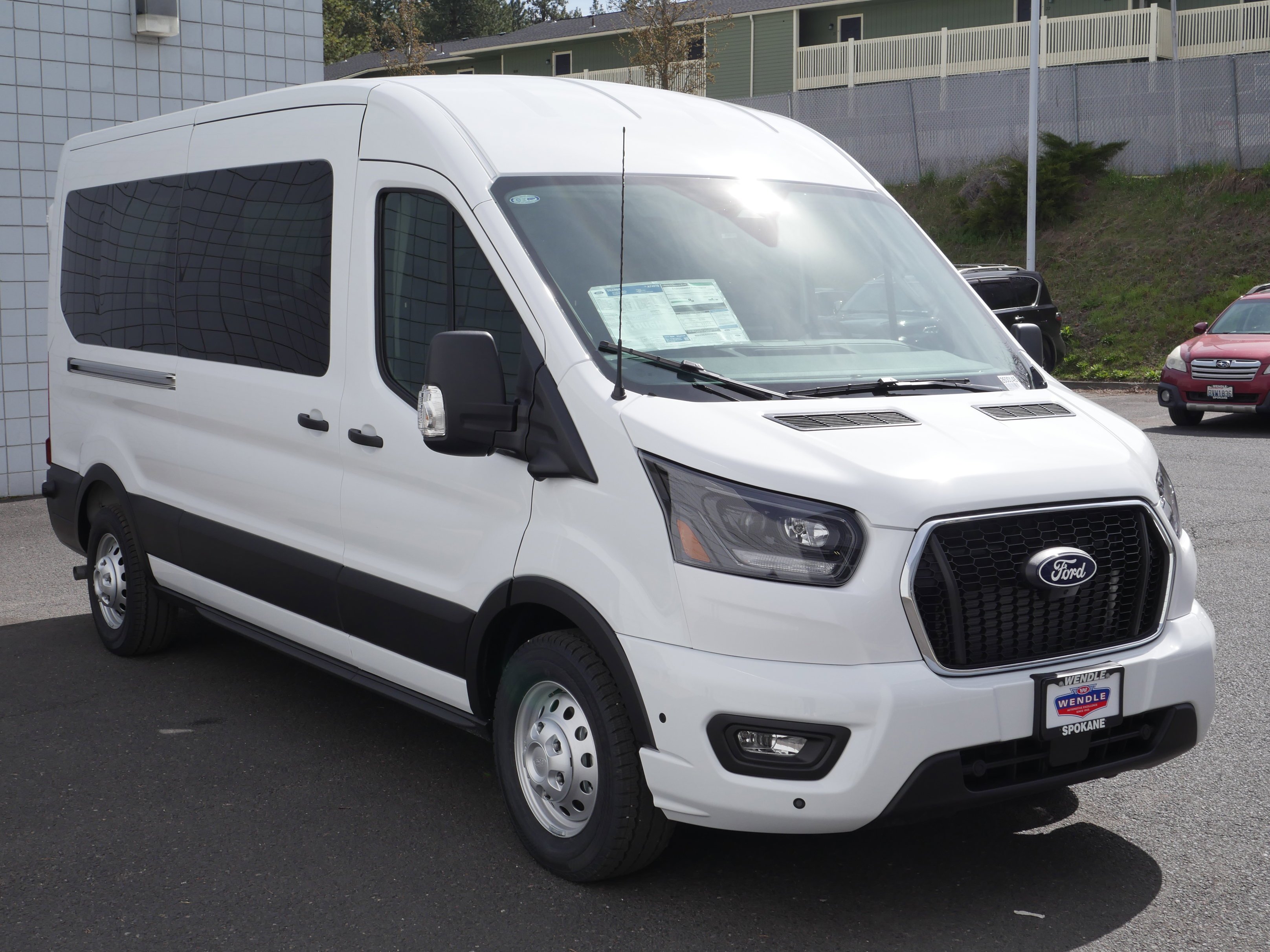 New 2026 Oxford White Ford Passenger Van XLT image 29