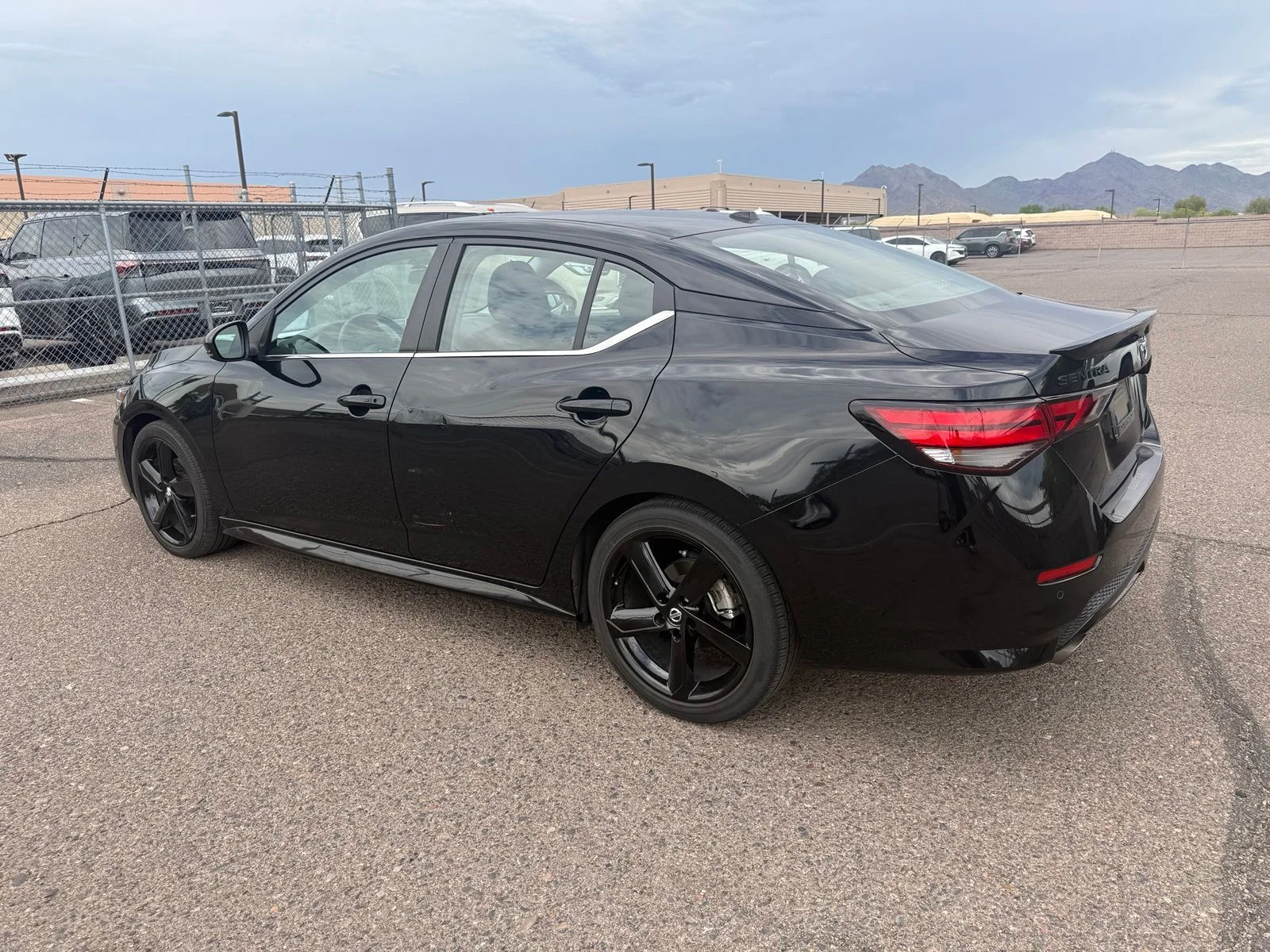 Used 2023 Super Black Nissan SR image 6