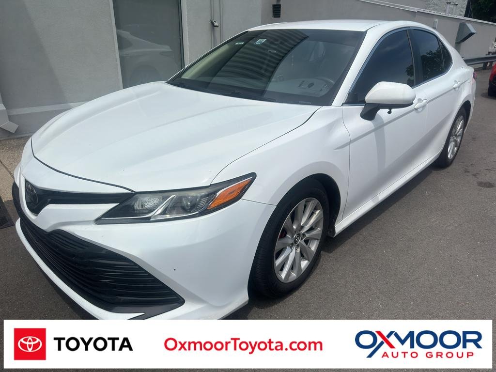 Used 2019 Super White Toyota LE image 1
