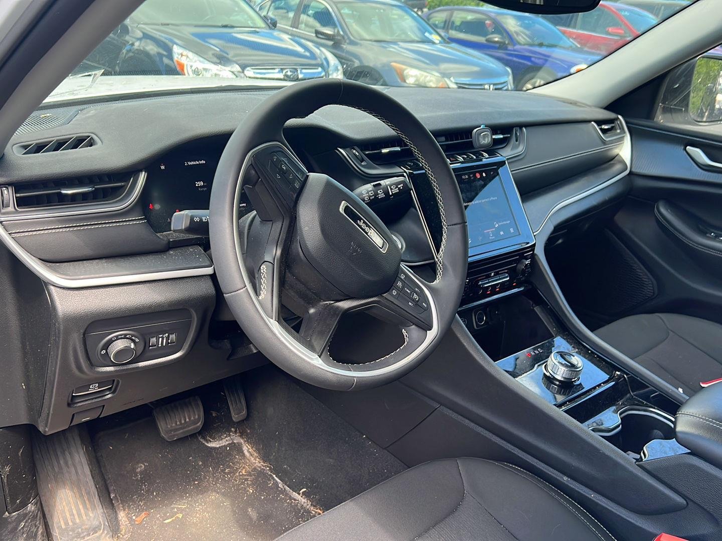 Used 2023 Bright White Clearcoat Jeep Laredo image 4