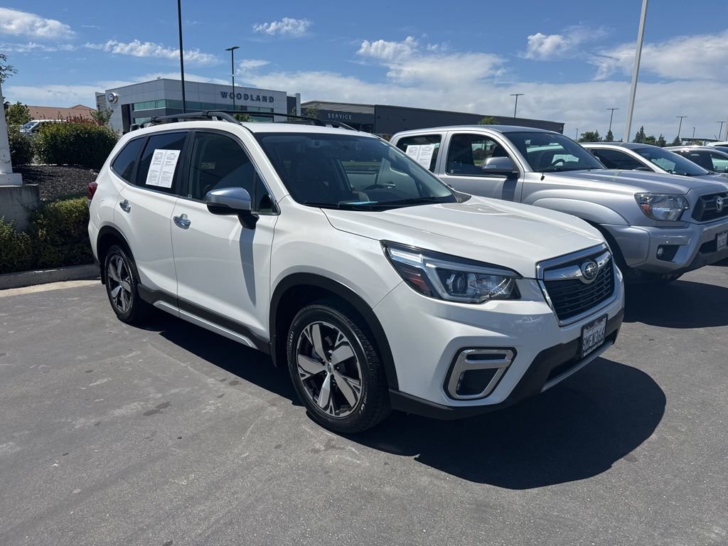 Used 2019 Crystal White Pearl Subaru Touring image 1