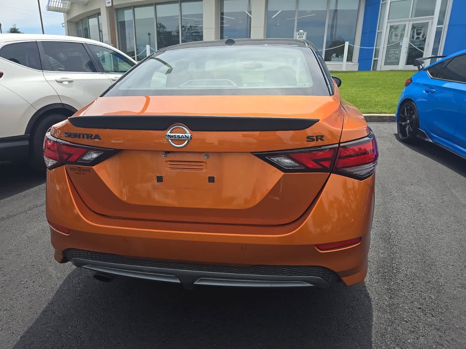 Used 2023 Monarch Orange Metallic/Super Black Nissan SR image 5