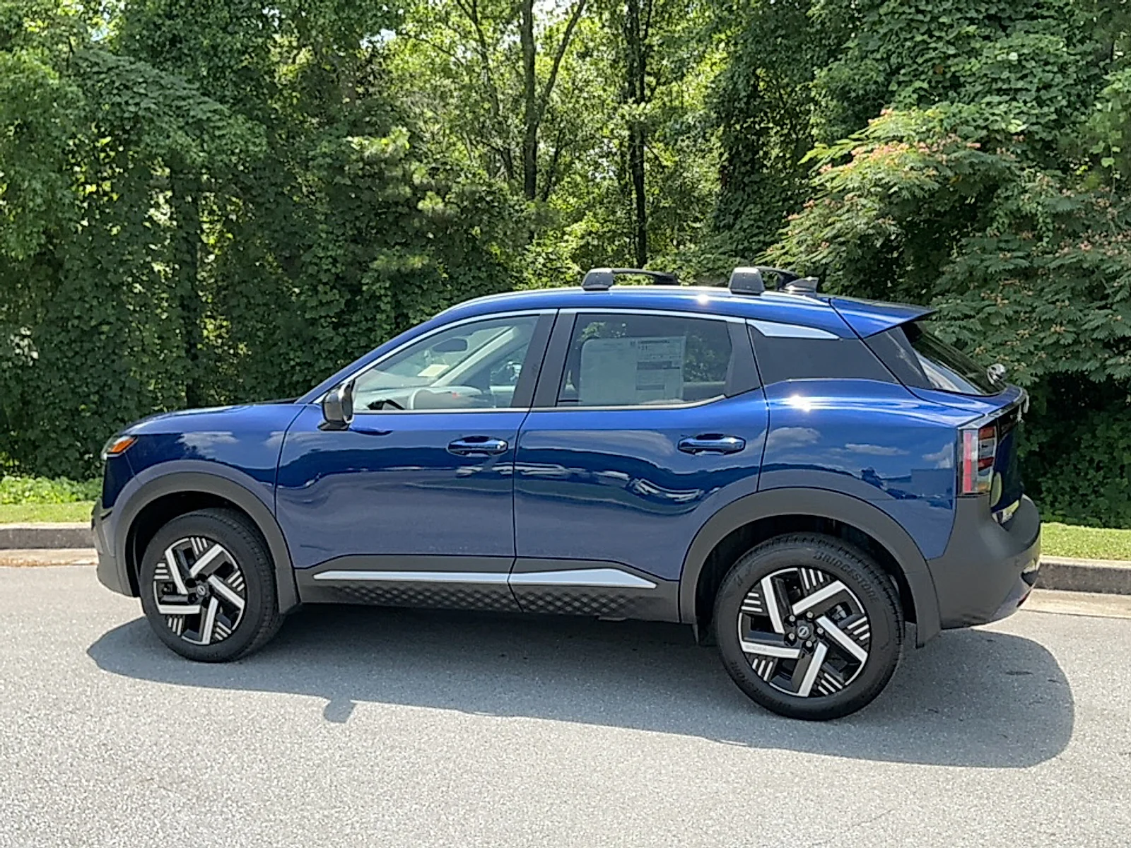 New 2026 Deep Blue Pearl Nissan SV image 3