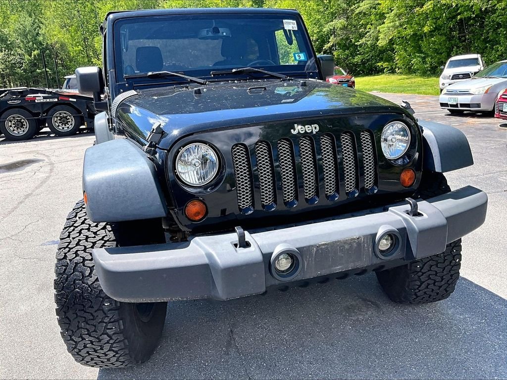 Used 2013 Black Clearcoat Jeep Sport image 5