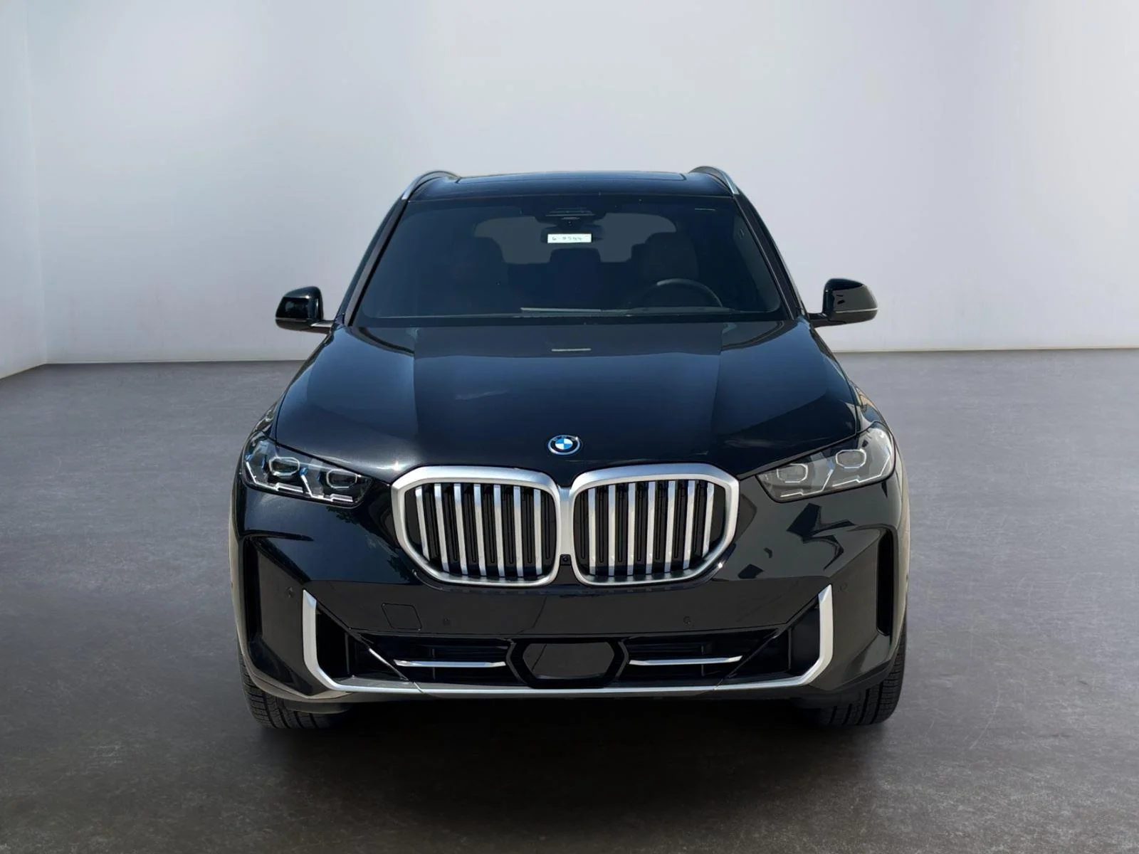 New 2026 Black Sapphire Metallic BMW xDrive50e image 8