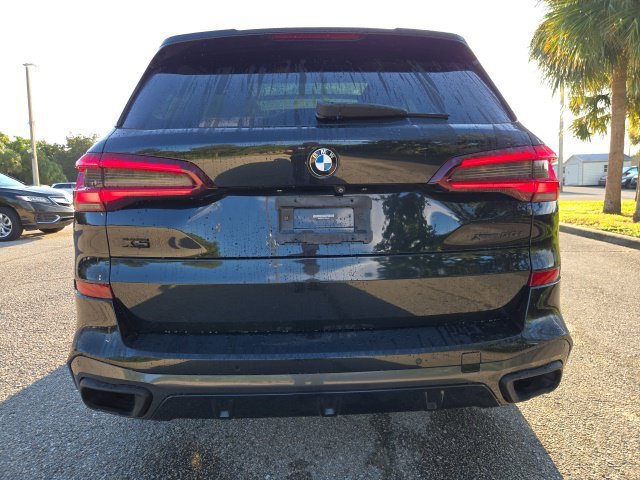 Used 2020 Black Sapphire Metallic BMW sDrive40i image 4