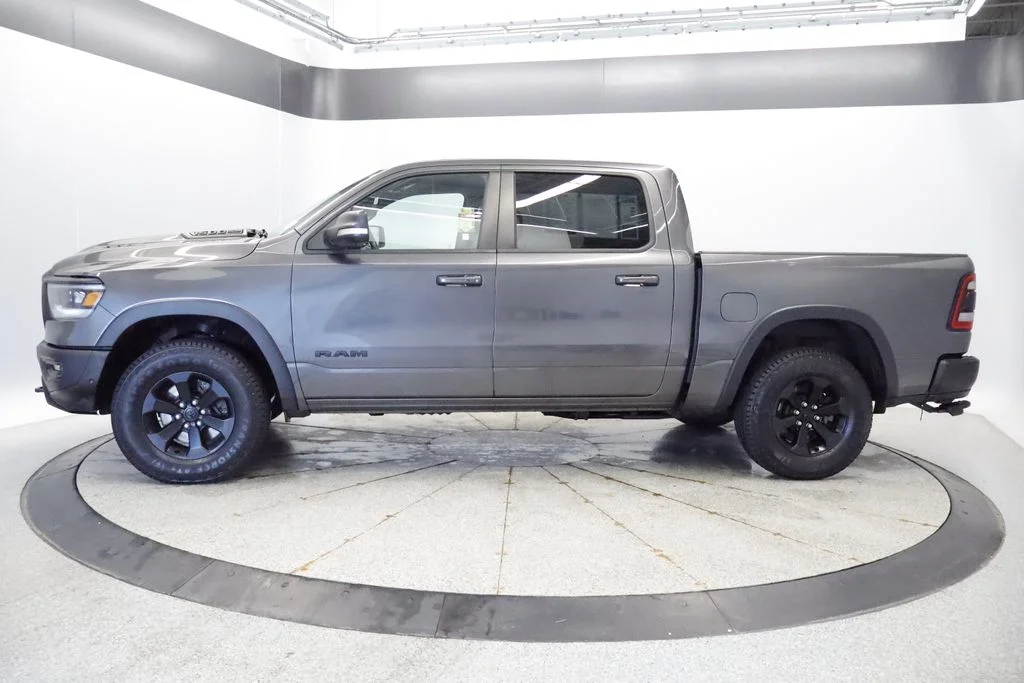 Used 2021 RAM Ram 1500 Pickup Rebel with VIN 1C6SRFLT2MN582139 for sale in Coon Rapids, Minnesota