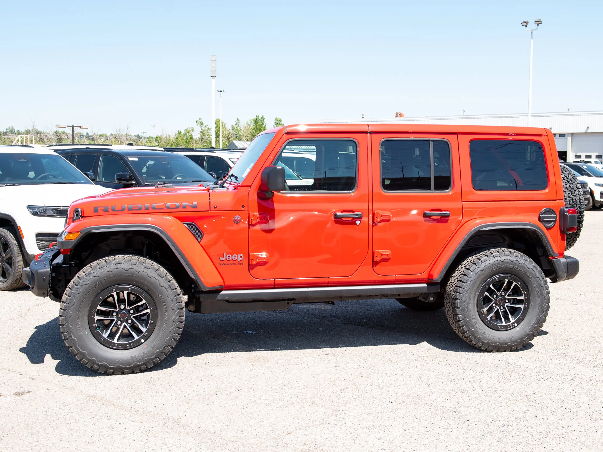 New 2026 Red Jeep Rubicon X*, 35 Inch Tires, Steel Bumpers, Nappa Leather image 2