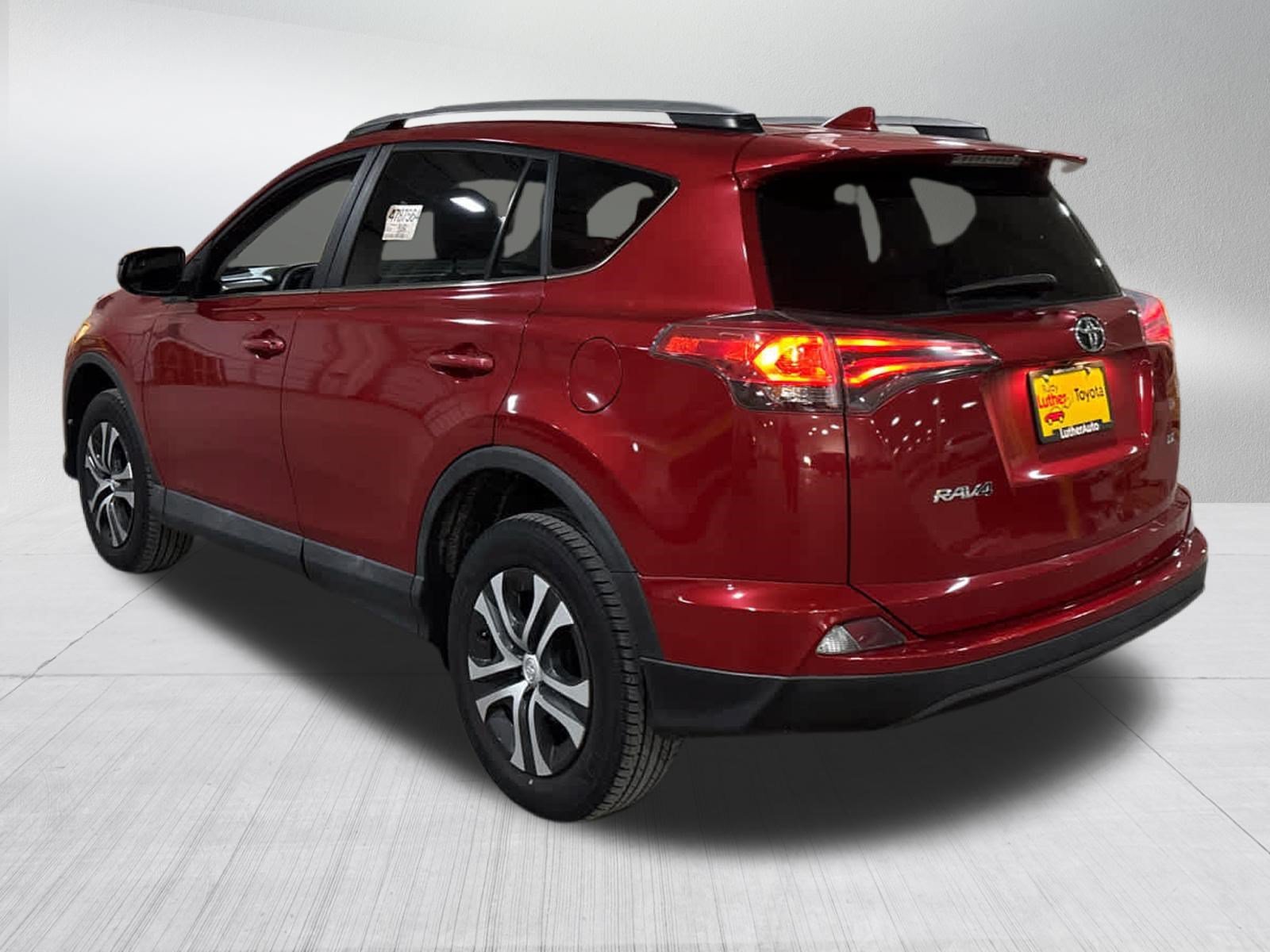 Certified Used 2017 Barcelona Red Metallic Toyota LE image 4