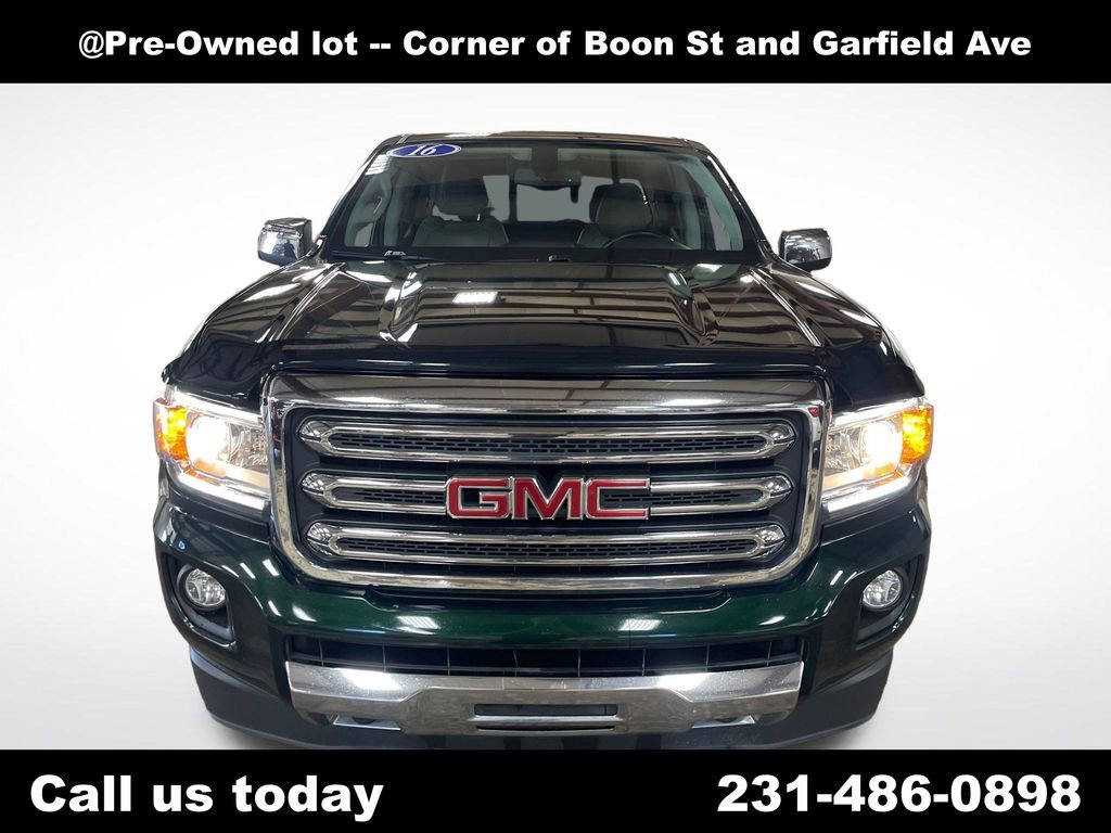 Used 2016 EMERALD GREEN METALLIC GMC 4WD SLT image 8