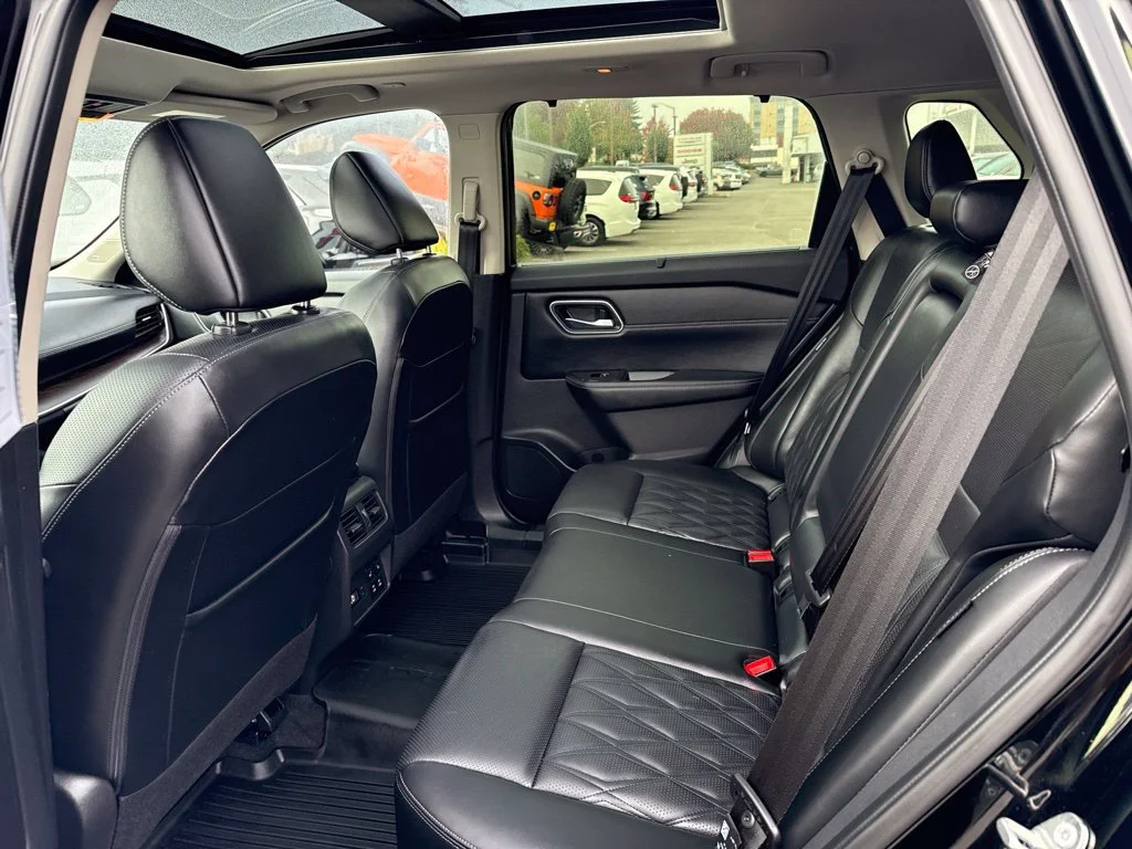Used 2024 Super Black Nissan Platinum image 14