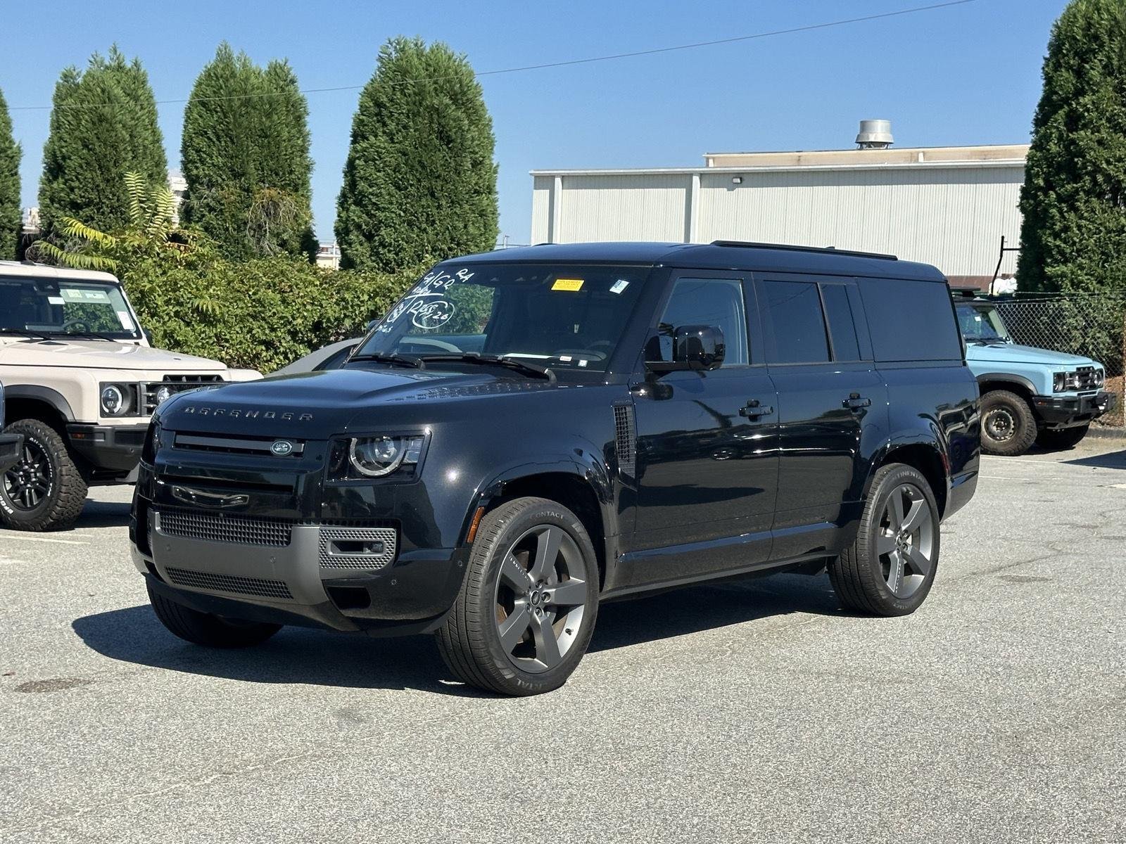 Used 2024 Santorini Black Metallic Land Rover Outbound image 1