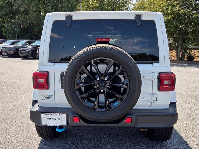 Used 2022 White Jeep Unlimited Sahara 4xe image 7