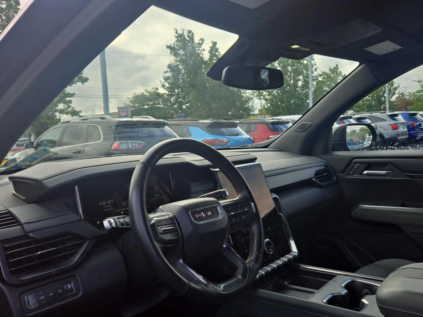 Used 2025 Ebony Twilight Metallic GMC AWD AT4 image 3