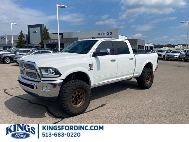 Used 2016 Bright White Clearcoat Ram Laramie Longhorn image 1
