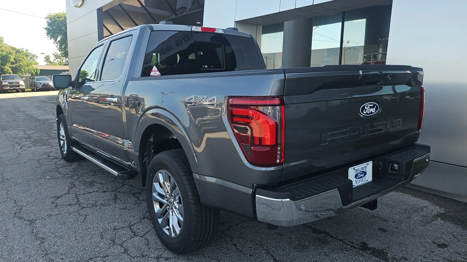 New 2026 Carbonized Gray Metallic Ford Lariat 4WD image 3