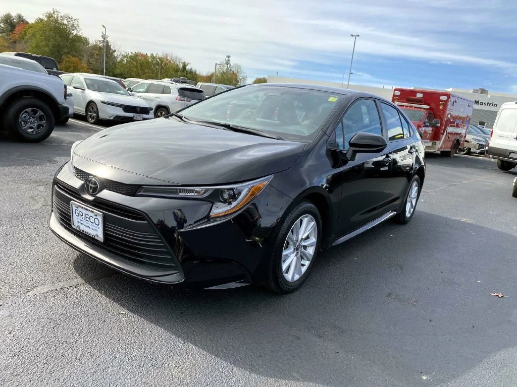 Used 2025 Midnight Black Metallic Toyota LE image 7