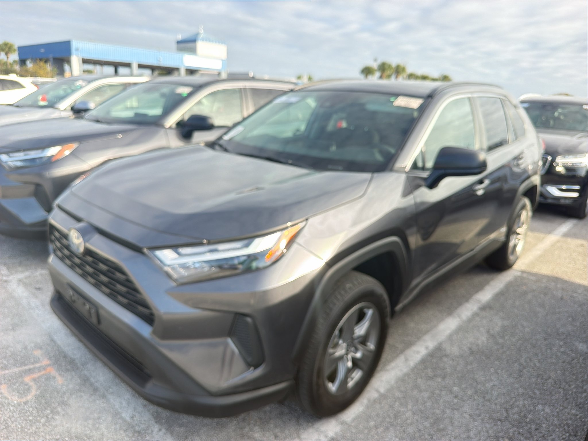 Used 2024 Magnetic Gray Metallic Toyota Hybrid LE image 1