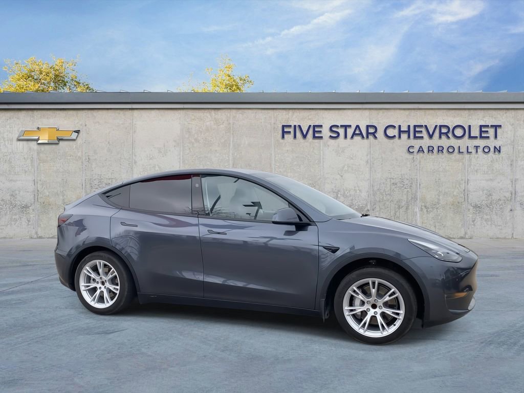 Used 2023 Tesla Model Y Base with VIN 7SAYGDED7PF949335 for sale in Carrollton, TX