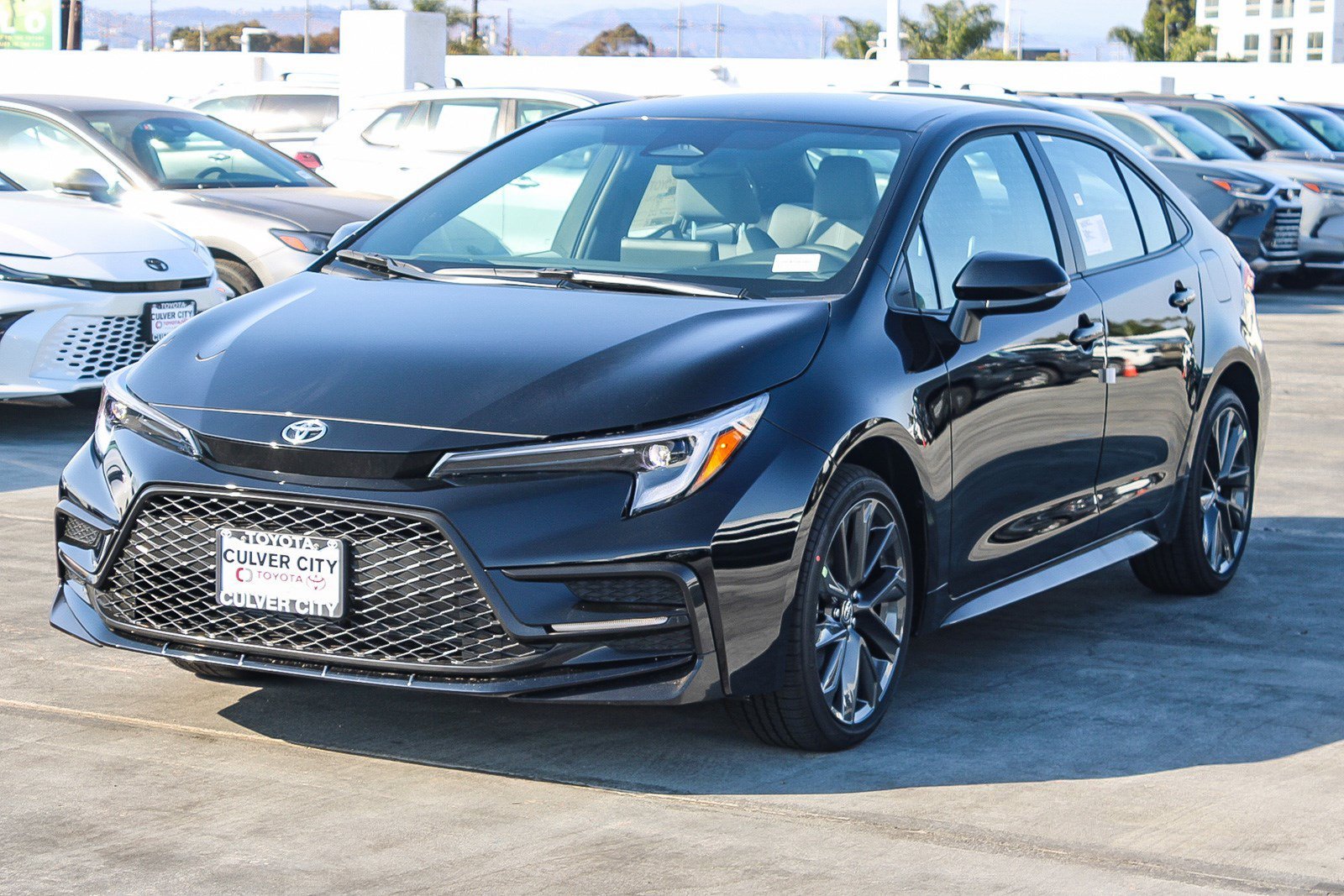 New 2026 Midnight Black Metallic Toyota  SE image 3