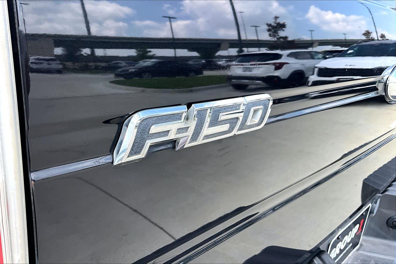 Used 2013 Tuxedo Black Metallic Ford Lariat image 27
