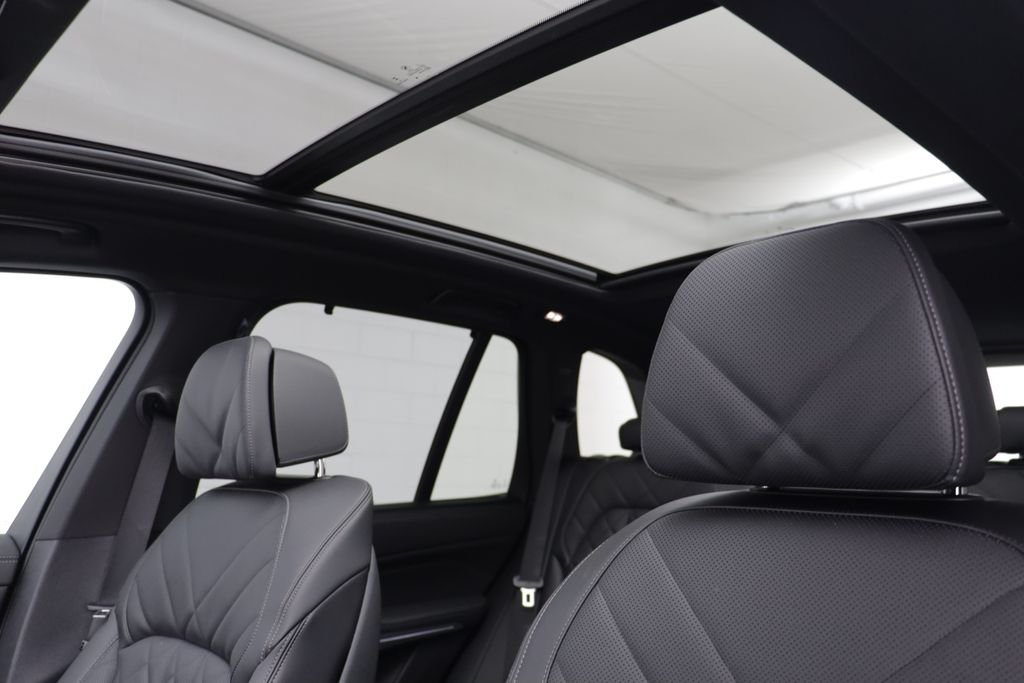 New 2026 Black Sapphire Metallic BMW xDrive50e image 14