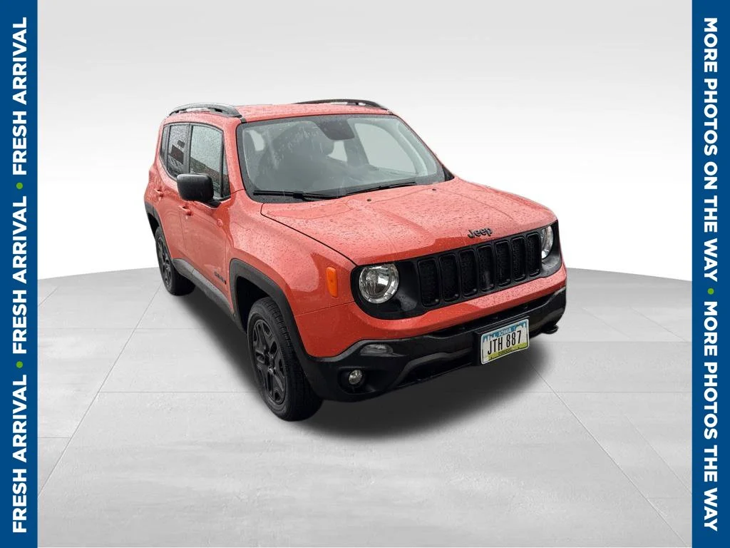 Used 2020 Orange Jeep Sport image 1