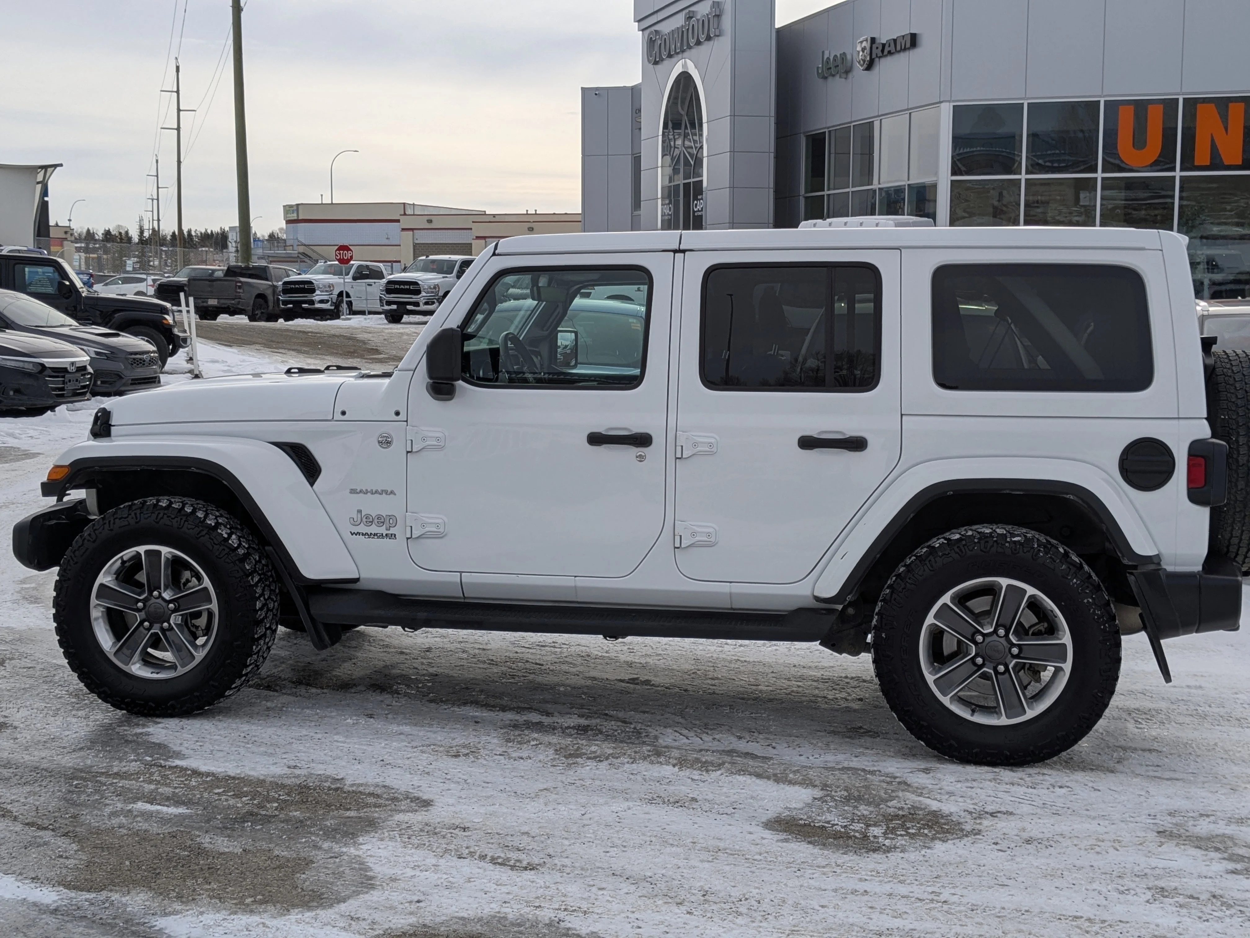 Used 2022 White Jeep Unlimited Sahara - Cold Weather Grp - Leather - Alpine Audio - Remote Start & More image 8